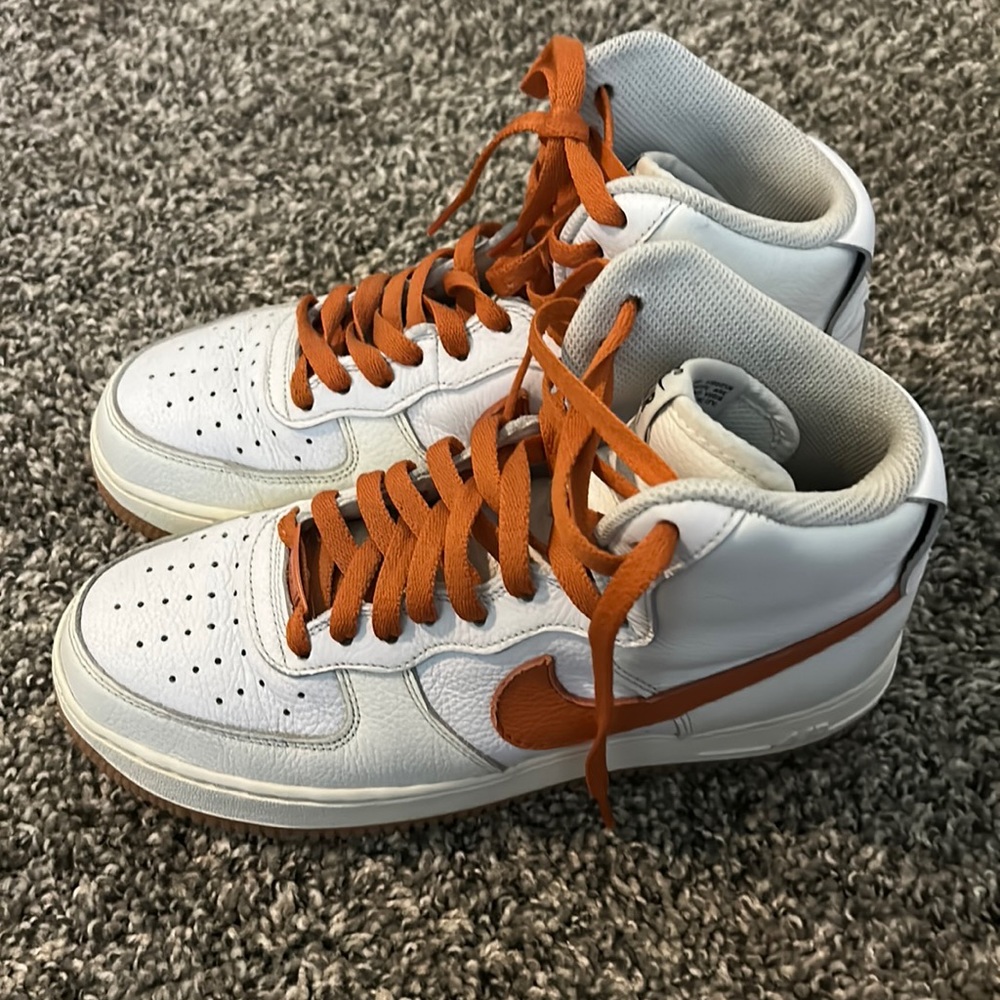White and orange Nikes high top